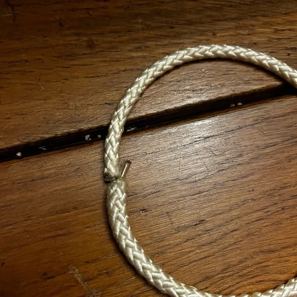 Choker with a white rope and gold dangling heart with gold hardware. - Picture 3 of 4